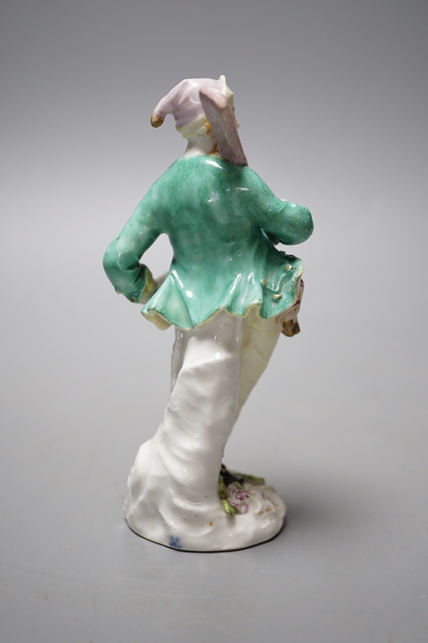 An 18th century Meissen figure of the Baker modelled by Peter Reinicke c.1755, 13.5cm tall